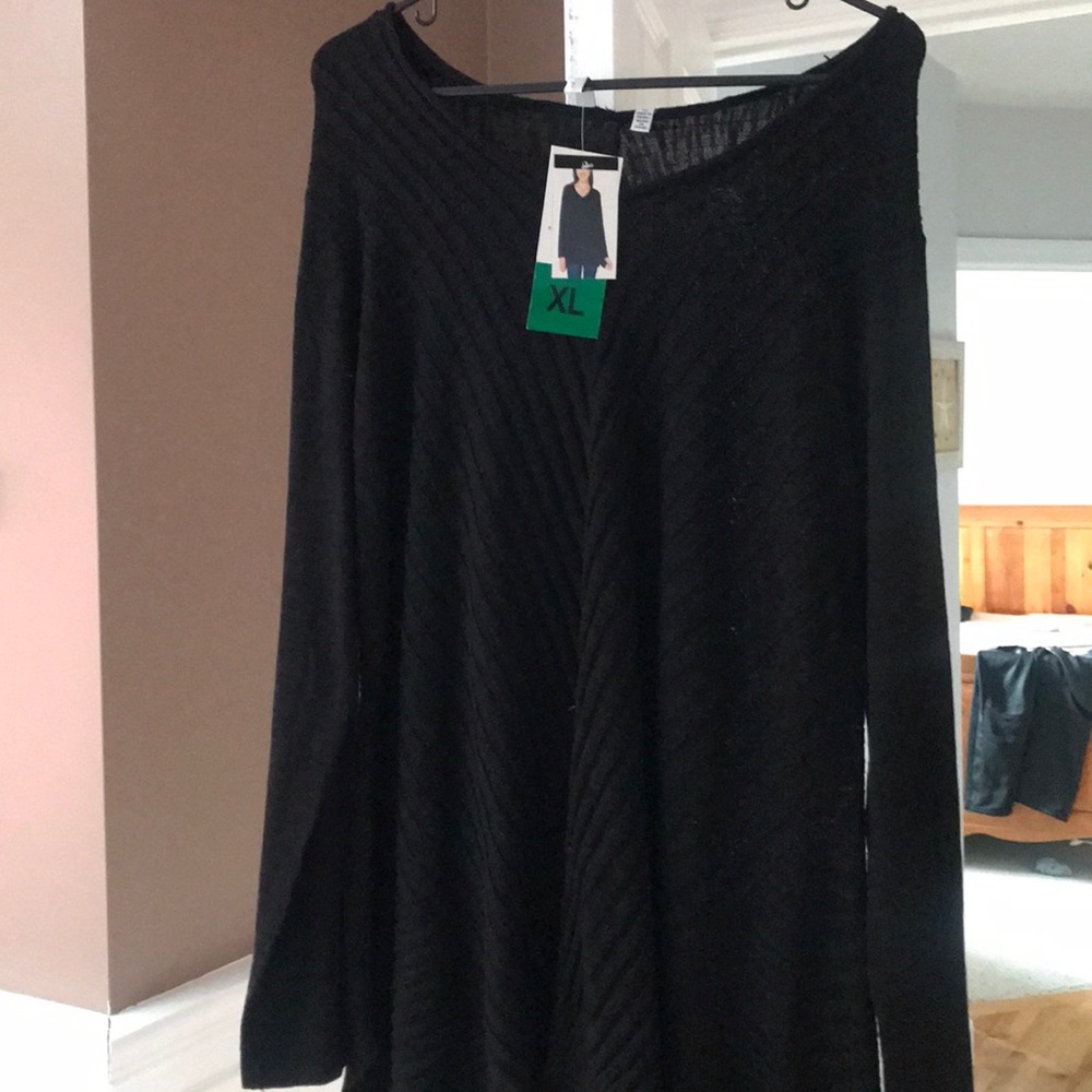 Size XL black sweater. New. Never worn. NWT